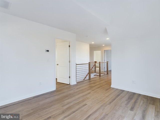 unfurnished room featuring light wood-type flooring