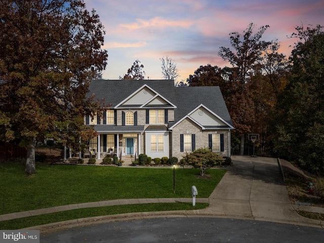 view of front of home featuring a yard