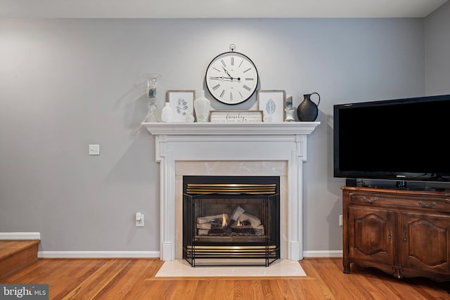 interior details featuring hardwood / wood-style flooring