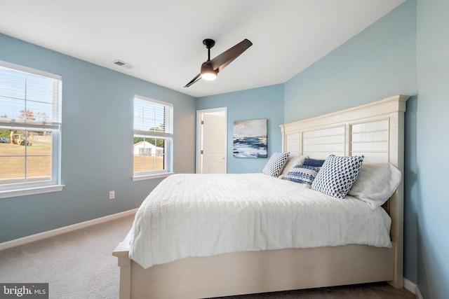 bedroom featuring ceiling fan and carpet floors