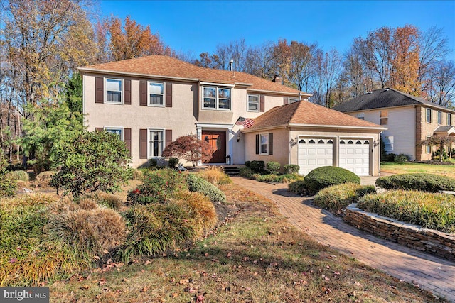 view of front of house with a garage