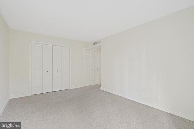 unfurnished bedroom featuring carpet floors