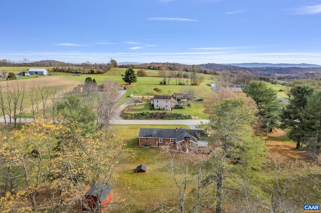 bird's eye view with a mountain view and a rural view