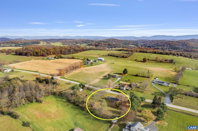 aerial view featuring a mountain view and a rural view