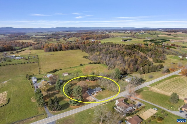 bird's eye view featuring a mountain view and a rural view