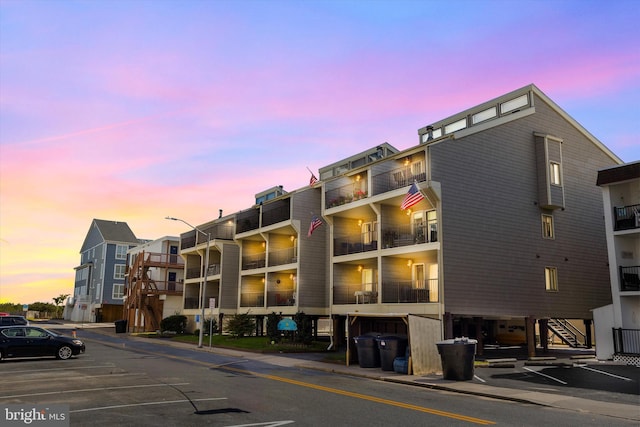 view of outdoor building at dusk