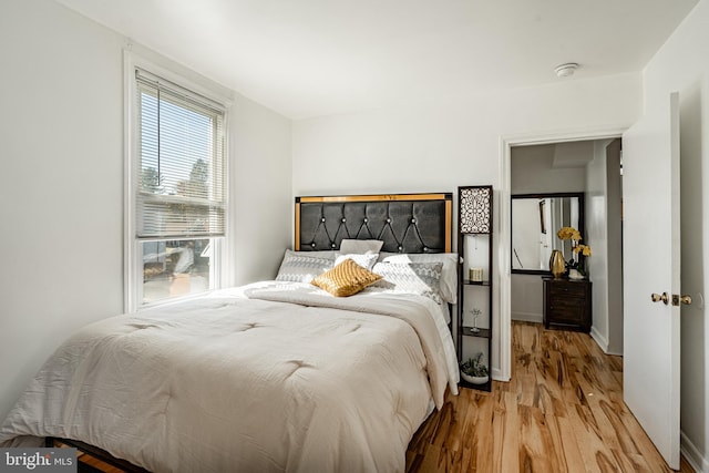 bedroom featuring light wood-type flooring