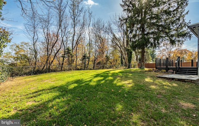 view of yard with a deck