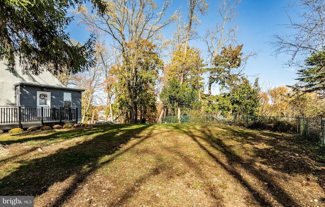 view of yard with a deck