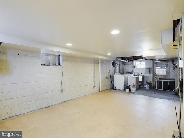 below grade area featuring independent washer and dryer