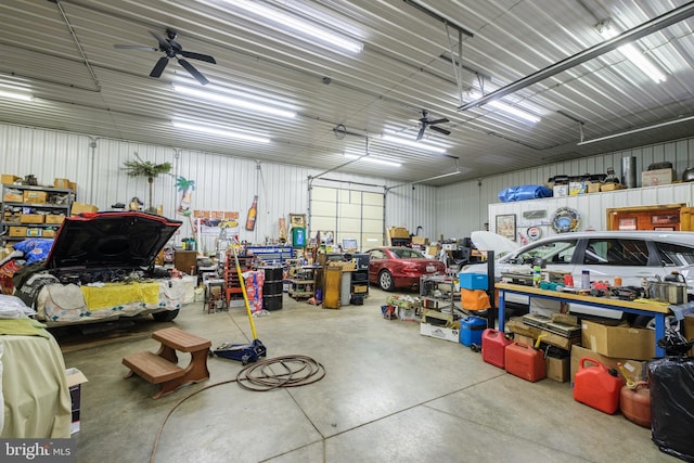 garage featuring a workshop area and ceiling fan