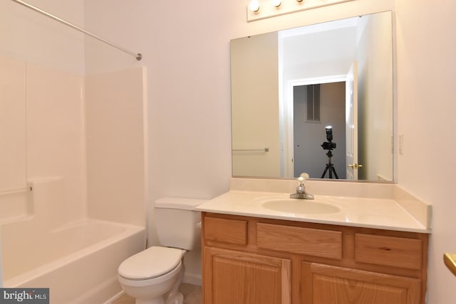 full bathroom featuring vanity, shower / tub combination, and toilet