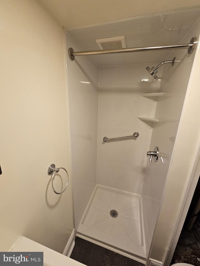 bathroom with walk in shower