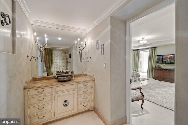 bathroom with vanity, tile patterned floors, and crown molding