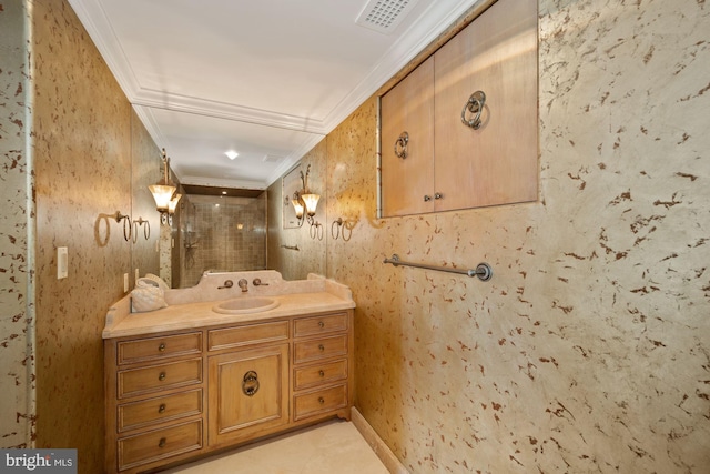 bathroom with vanity and crown molding