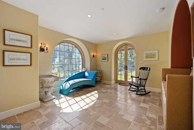 living area featuring french doors