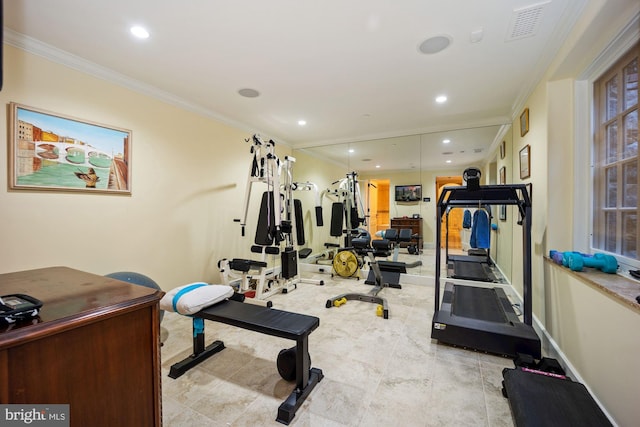 workout room with crown molding