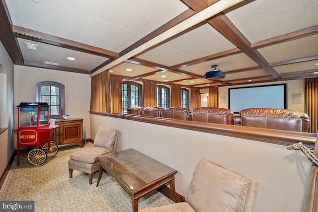 living room with beam ceiling, a textured ceiling, and coffered ceiling