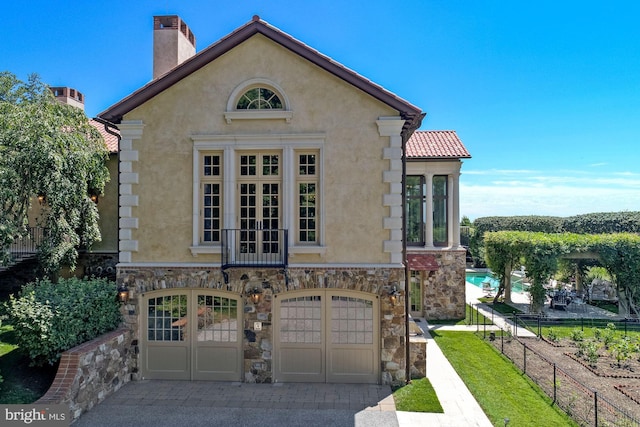 view of front of home featuring a garage