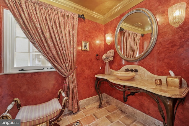 bathroom featuring crown molding