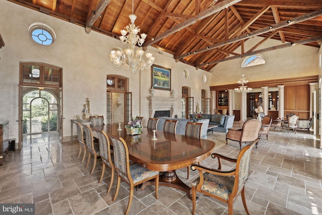 dining room with high vaulted ceiling, beamed ceiling, wooden ceiling, and a notable chandelier