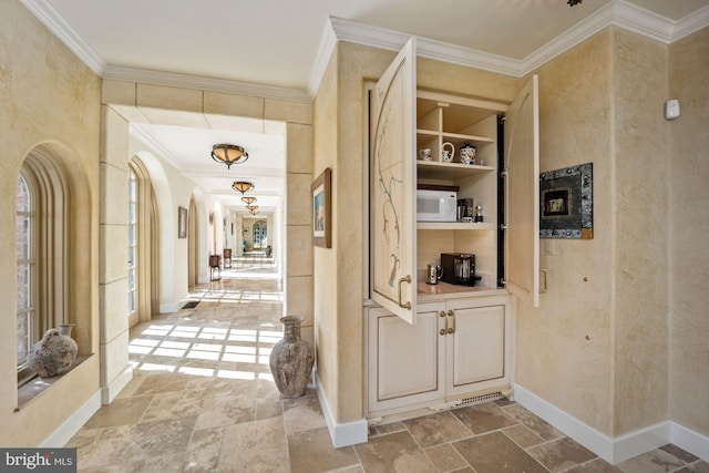 hallway with crown molding