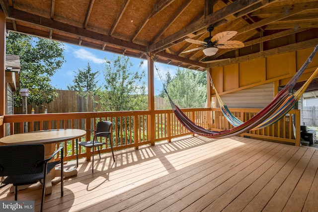 wooden terrace featuring ceiling fan