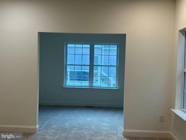 unfurnished room with carpet