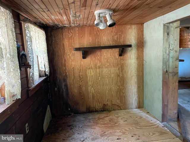 interior space featuring wood ceiling