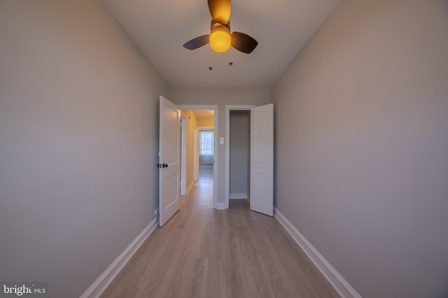 corridor featuring light hardwood / wood-style flooring