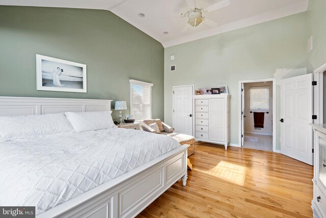 bedroom with high vaulted ceiling, light wood-type flooring, and ceiling fan