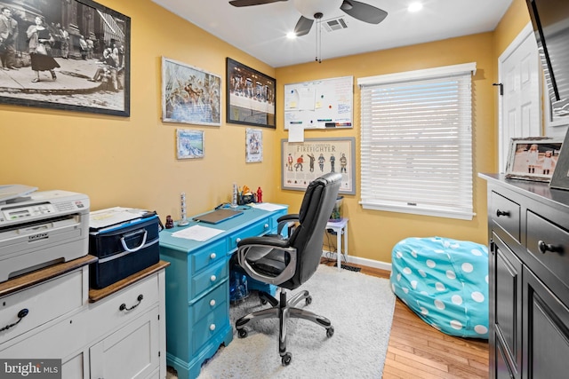 office featuring light wood-type flooring and ceiling fan