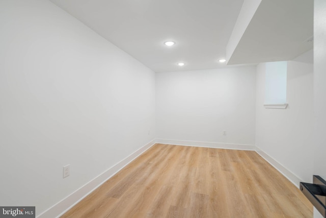 spare room featuring light hardwood / wood-style flooring