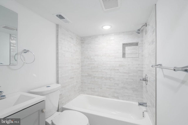 full bathroom with washtub / shower combination, toilet, and vanity