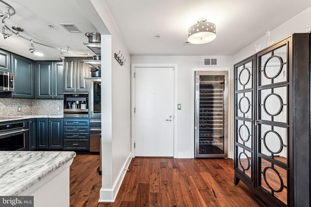 interior space featuring dark hardwood / wood-style flooring and wine cooler