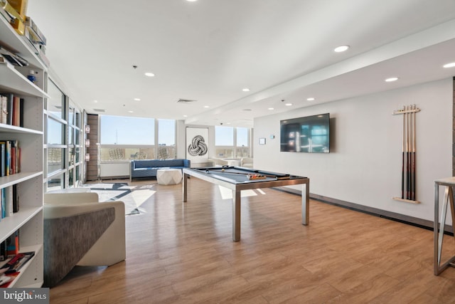 playroom featuring light hardwood / wood-style flooring and billiards