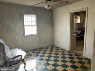 unfurnished room featuring ceiling fan