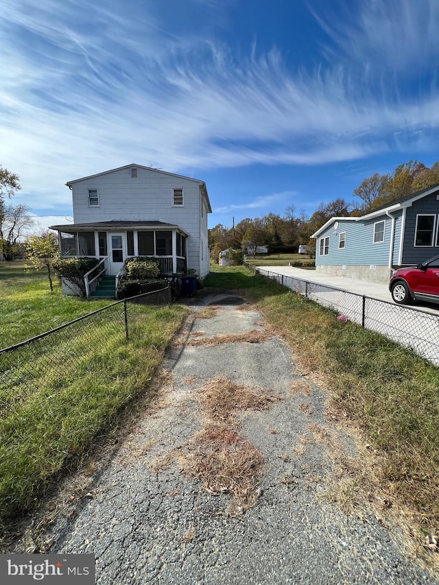 view of home's exterior with a yard