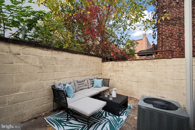 view of patio / terrace featuring central AC and an outdoor living space