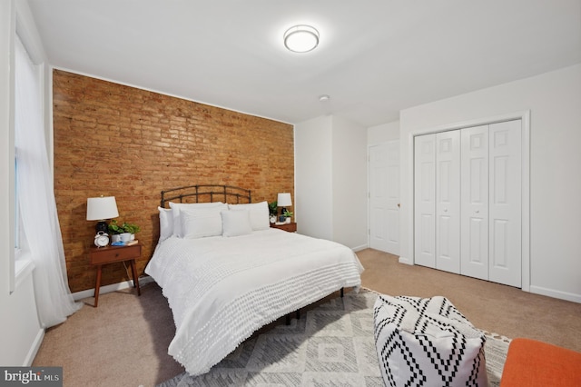 bedroom featuring a closet and carpet floors