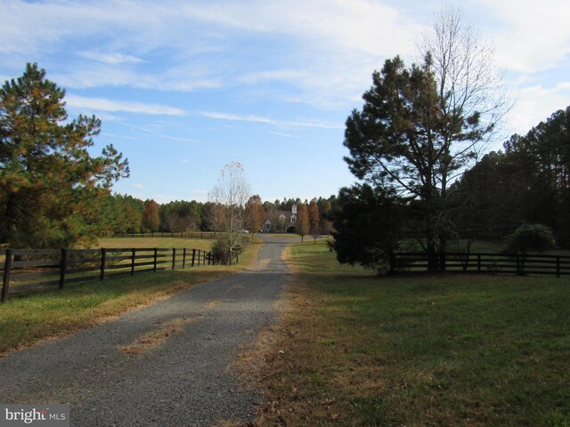 view of street featuring a rural view