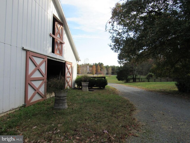 exterior space featuring an outbuilding