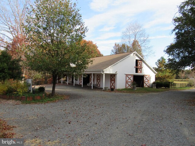 view of front facade with an outbuilding