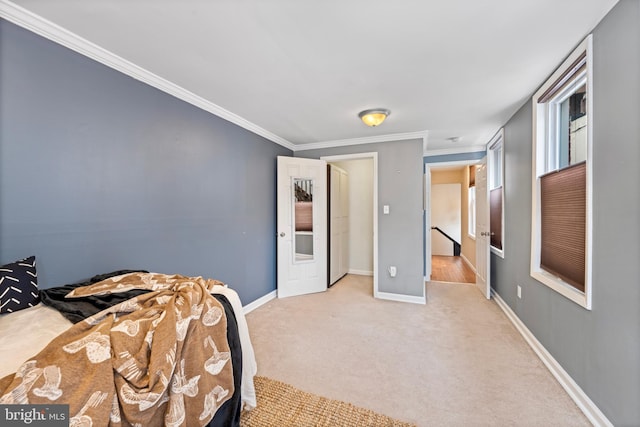 bedroom featuring light carpet and ornamental molding