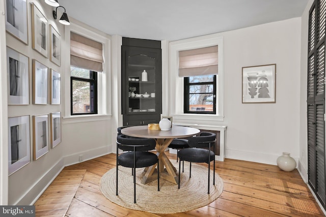 dining space featuring light hardwood / wood-style flooring