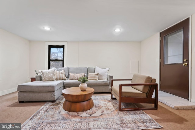 living room featuring light carpet