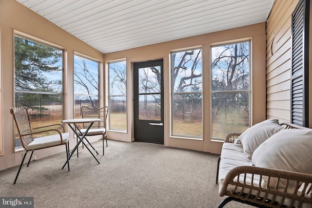 sunroom with lofted ceiling