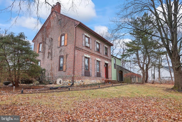 view of home's exterior featuring a yard