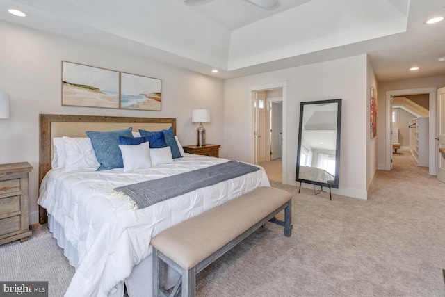 bedroom featuring light colored carpet