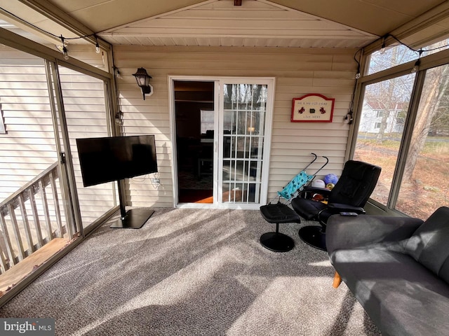 sunroom / solarium featuring wooden ceiling